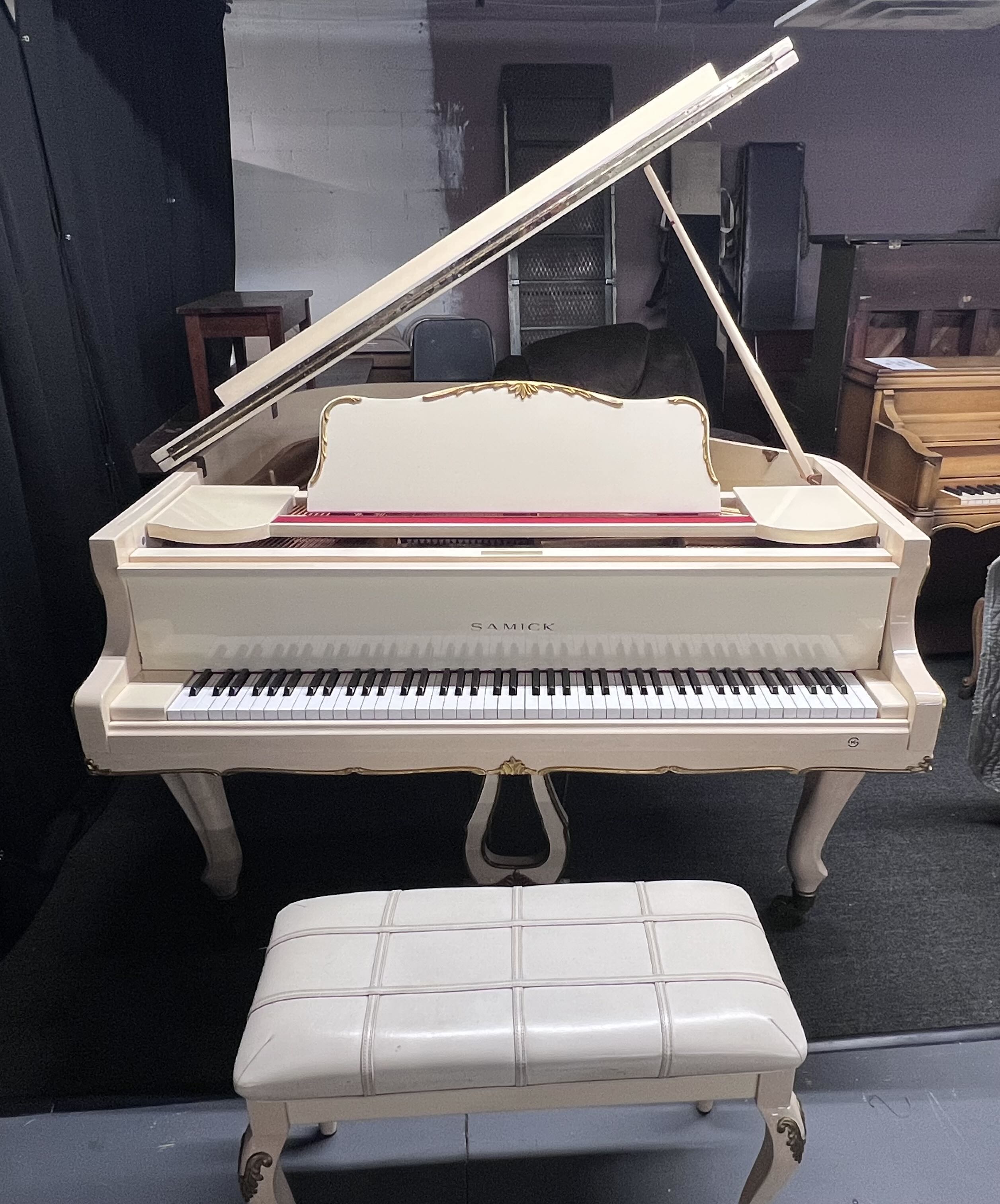 Samick in White Ivory with Gold Trim